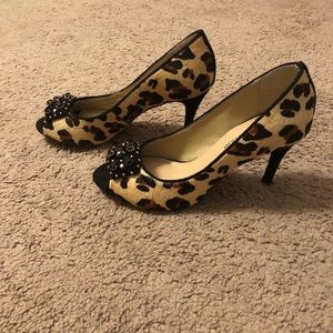 Peep toe Cheetah pumps